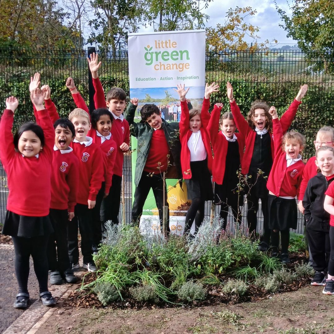 Plants for pollinators bed creation at Axminster Community Primary Academy.